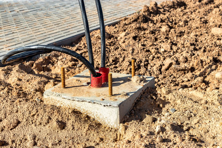 The ends of the electrical cable in the trench. electrical cable installation. Foundation for...