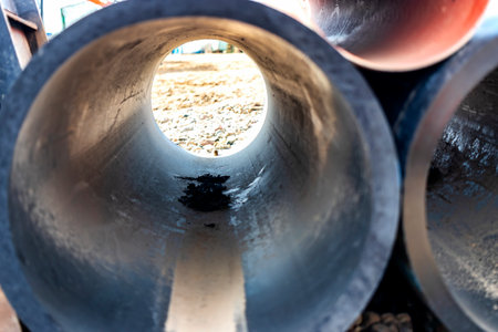 Water pipes polymer close-up. View of the pipes from the inside. System for supplying water to residential buildings. Stacked pipes at the construction siteの写真素材