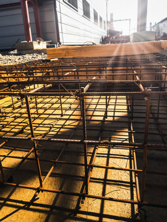 Foundation site of new building, details and reinforcements with steel bars and wire rod, preparing...