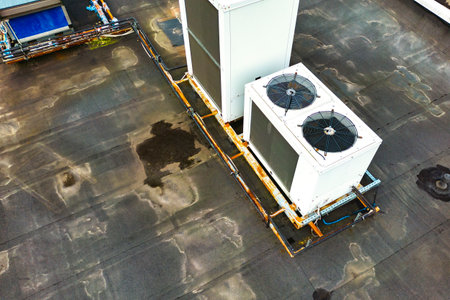 Ventilation and air conditioning system on the roof of an office or industrial building. view from above. air cleaning. drone photographyの写真素材