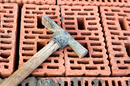 Construction tool for laying bricks and blocks. Bricklayer's tools - hammer, spatula, trowel,...