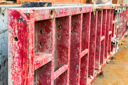 Reinforced concrete foundation of a modern monolithic residential building. Prepared formwork with...