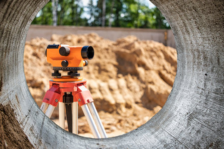 Geodetic level at the construction site. Indication of the elevation of the building under construction. close-up. Blurred backgroundの写真素材