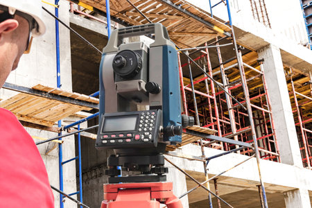 surveyor equipment. Surveyors telescope at construction site or Surveying for making contour plans...