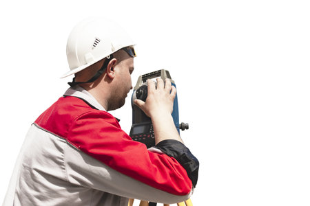 Surveyor engineer measures the level on a white isolated background. Surveyors provide accurate...