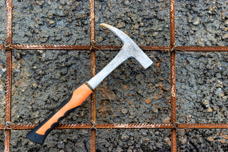 Construction tool for laying bricks and blocks. Bricklayer's tools - hammer, spatula, trowel,...