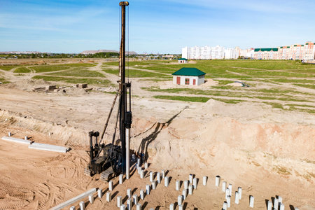 Pile driving machine. Diesel hammer pile driving machine working on construction site. Preparation...