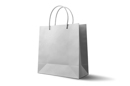 Recycled paper shopping bag on white isolated background. mockup. Element for designの素材