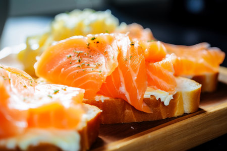A delicious appetizer of fresh fish. Salmon or trout sandwich. Tender sandwich with fish bread and butter close-upの素材