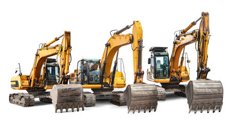 A lineup of powerful construction excavators and other equipment lined up next to each other at a construction site. Isolatedの写真素材