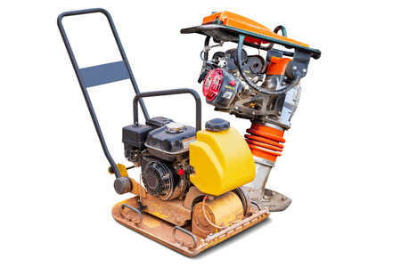 A small soil compactor machine, ready for use. The machine is compact and designed for soil compaction purposes. Isolatedの写真素材