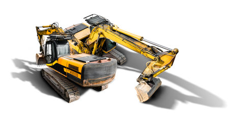 A powerful yellow construction excavator stands on a clean white background. This heavy-duty equipment is designed for excavation work on construction sites. Isolatedの写真素材
