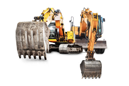 The image shows two powerful construction excavators positioned next to each other, ready for excavation work at a construction site. Isolatedの写真素材
