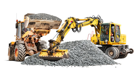 Wheel excavator with wide bucket isolated on white background. A powerful excavator with a loader close-up unloads crushed stone or gravel. Rental of construction equipment. design elementの写真素材