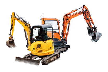 Mini excavators excavator isolated on white background. Construction equipment for earthworks in cramped conditions. Rental of construction equipmentの写真素材