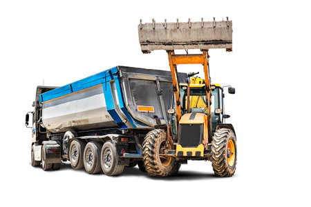 Mining dump truck and bulldozer loader close-up on a white isolated background.Construction equipment for earthworks. element for designの写真素材