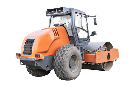 Heavy-duty vibratory roller for asphalt paving on white isolated background. Road construction equipment. Image of a road roller for designの写真素材