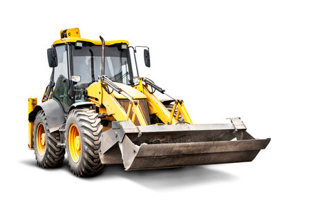 Heavy front loader or bulldozer on a white isolated background. construction machinery. Transportation and movement of bulk materials. Large bucket for earth, sand and gravelの写真素材