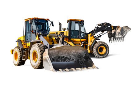 Two heavy front loaders or bulldozers on a white isolated background. Construction equipment and transport. Transportation and movement of bulk materials. Excavation. Element for designの写真素材