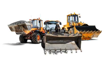 Three heavy wheeled front loaders or bulldozers on a white isolated background. Construction equipment and transport. Transportation and movement of bulk materials. Excavation. Element for designの写真素材