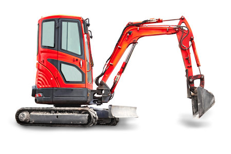 Small or mini excavator with clipping path isolated on white background. Construction equipment. isolated objectの写真素材