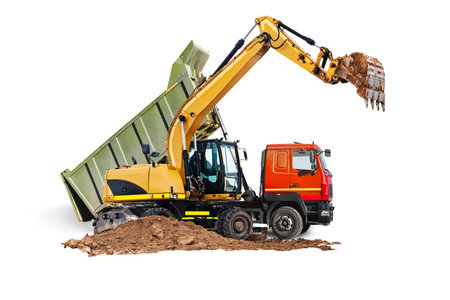 Large dump truck and excavator close-up on a white isolated background.Construction equipment for earthworks. element for design. Rent of modern construction equipmentの写真素材