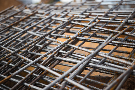 Reinforcing mesh at the construction site. Reinforcing cages for foundations and grillages. Close-up. Melaconstructions in modern constructionの写真素材