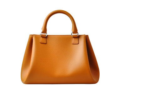 A beautifully designed women's handbag features a sleek silhouette and a rich, warm color, offering an artistic touch against the clean white backdrop.の写真素材