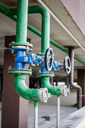 A fire hydrant is installed in a contemporary residential complex, emphasizing the importance of...