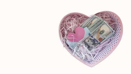 Pink heart gift dollar box for valentines day on white backgroundの写真素材
