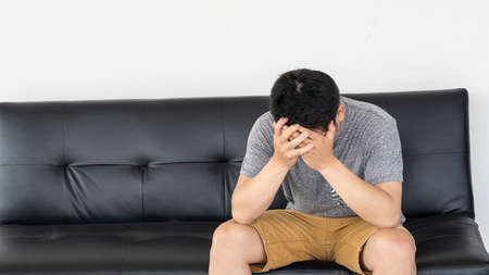 The man who covered his face because of the stress of being unemployed and sat on a Chopa.