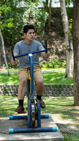Young Asian men exercising in the park