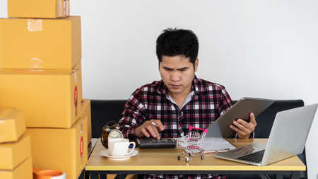 Startup Entrepreneurship Small Business SME Young Man Work At Home Office Smart Phone Laptop Online...