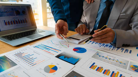 business people meet with design ideas business planning Picture of two young businessmen holding...