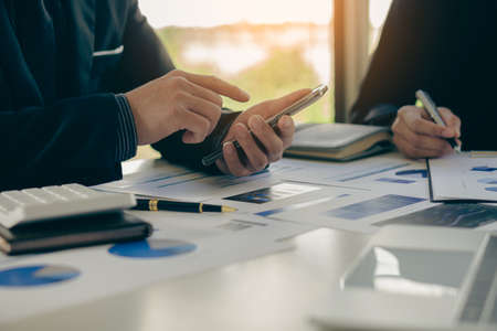 business people meet with design ideas business planning Picture of two young businessmen holding...