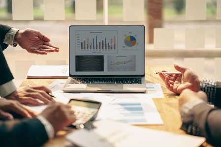 Business team meeting to meet professional investors working on new marketing business strategies. Project discussion and data analysis, charts and graphs, finance and accounting wの写真素材