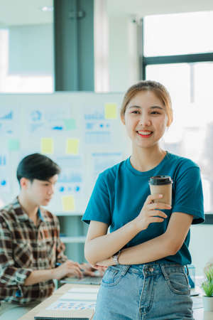 Young Asian Entrepreneurs Planning Startup Businessesの写真素材