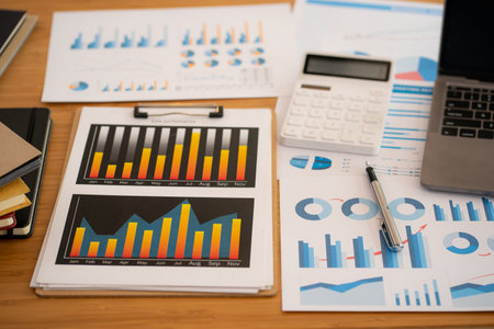 financial business concept with financial graph and laptop computer in office