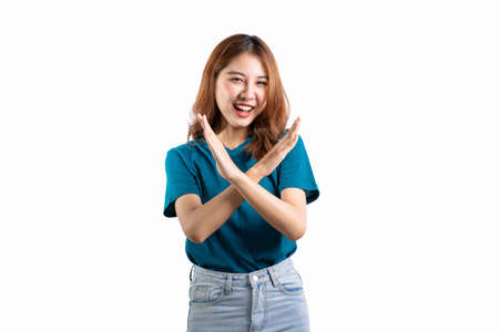 Portrait of an Asian woman smiling and extending her hand to present something with hands gesturing,...