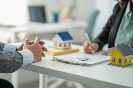 Real estate agents advise clients to enter into contracts to purchase houses and land after the...