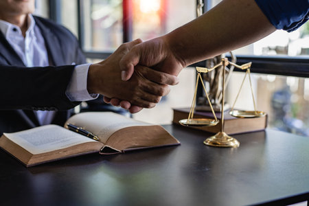 Lawyers shake hands with businessmen to make a deal. legal advisor Various contract consulting...