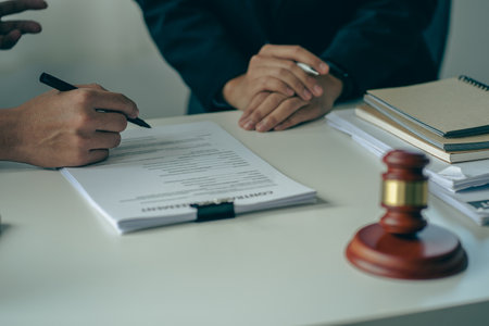 Hammer, judge, lawyer, businessman, scales, god of justice, laptop notebook on the table, legal advisor concept.の写真素材