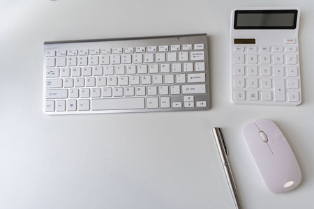 keyboard and mouse calculator on the table