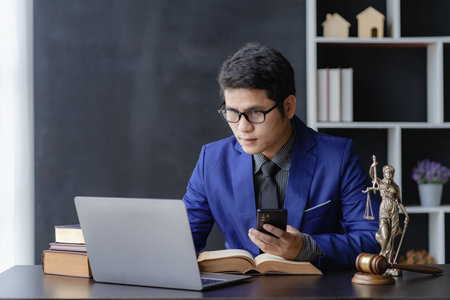 legal advisor concept Asian male lawyer working in office
Fairness Attorneys provide legal advice on the legality of business contracts.の写真素材