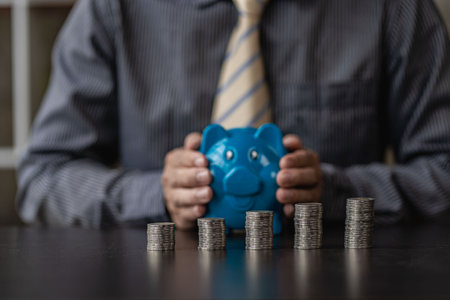 allocate some money Savings in the piggy bank for personal expenses and future development. economic conceptの写真素材