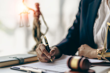 Male lawyer in suit or judge working on documents legal and justice advice Businessman working at...