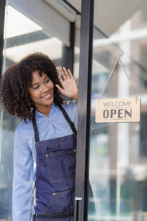 Barista Startup Coffee Shop Entrepreneur African American Woman Standing at the Door of a Casual...