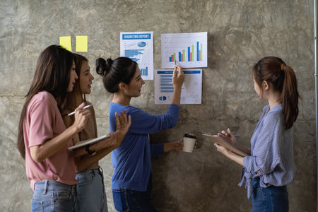 Brainstorming sessions discuss plans for product launches, planning, strategies, new business development. Working with Asian creative start-up projectsの写真素材