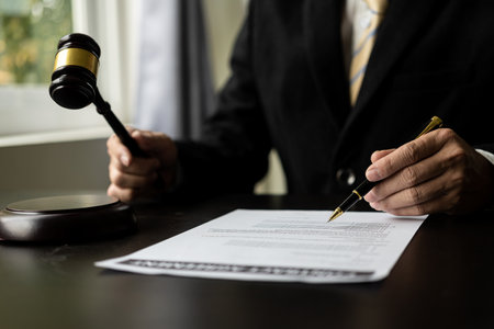 Lawyer working for consultant concept Judge gavel with justice lawyer businessman in suit or working...