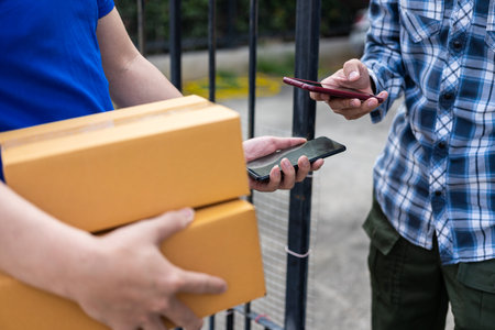 Three smartphones scan a QR code to pay for delivery workers, contactless transactions, cashless society, mobile internet payment, technologyの写真素材